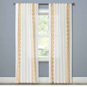 50"×84" Light Filtering Global Border Curtain
Panel White/Yellow - Opalhouse™